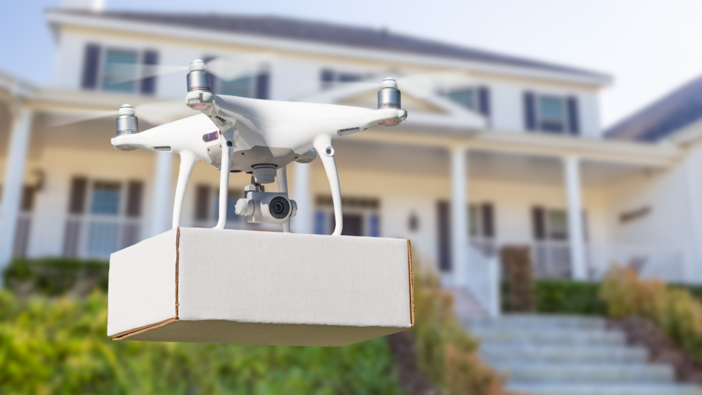 Drone fazendo entrega de uma caixa
